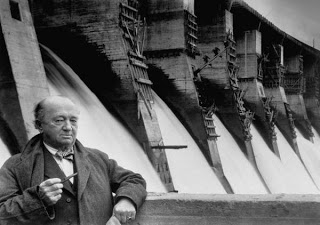 Dnieiperstoi, 1931 Col. Hugh Cooper, formerly of the US Army Corps of Engineers, posing in front of Russia's Dnieper River Dam, the largest in the world for which he was the chief consultant for its construction. [http://weimarart.blogspot.com/2011/02/margaret-bourke-white-soviet-union.html]